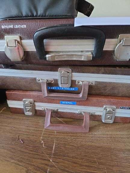 3 leather cassette cases and cassettes