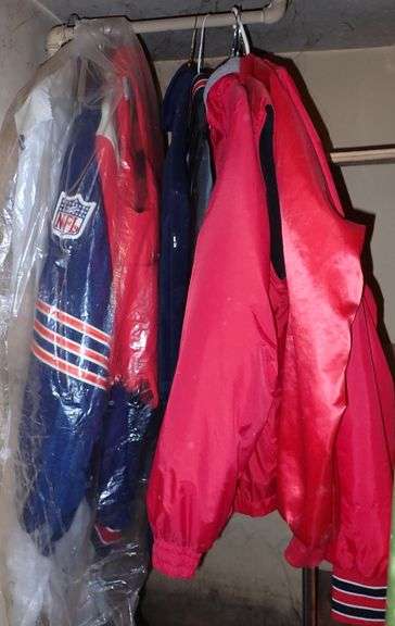 Collection of outerwear jackets in basement
