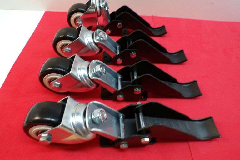 Lot of (4) Metal Casters