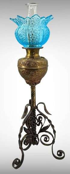 Antique Brass Victorian-Style Oil Lamp with Blue Daisy and Button Glass Shade and Wrought Iron Base