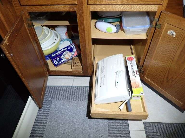 Cleanout rights to kitchen storage cabinets.  See all photos