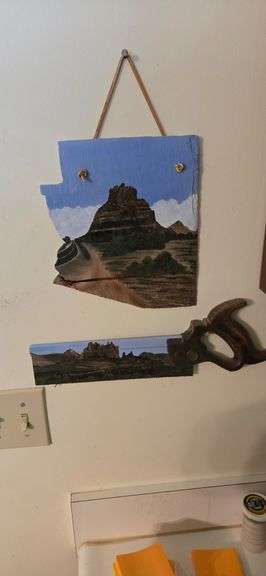 Painted hand saw and slate