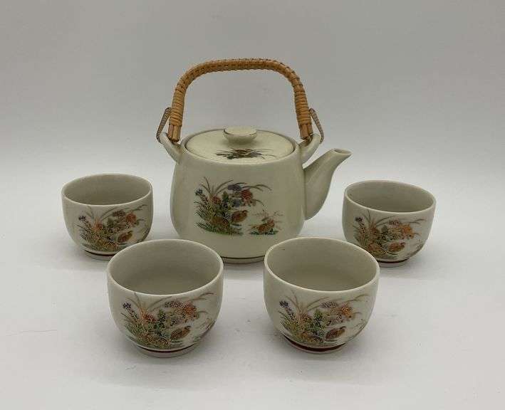 Japanese Tea Set Featuring a Teapot with Wrapped Bamboo Handle and Four Matching Cups