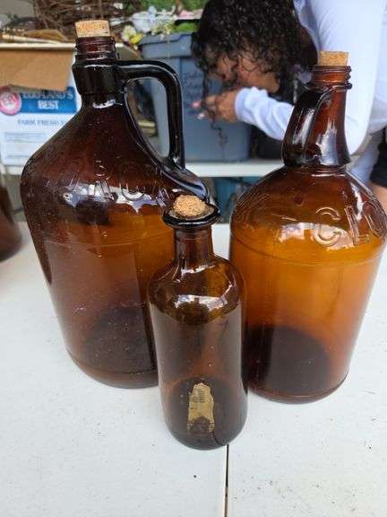 2 Large brown Clorox bottles