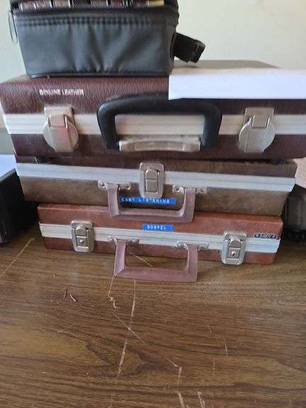 3 leather cassette cases and cassettes