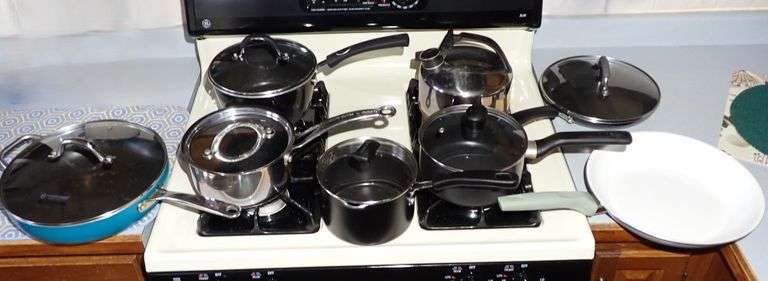 Collection of Clean Pans in the kitchen - See all photos