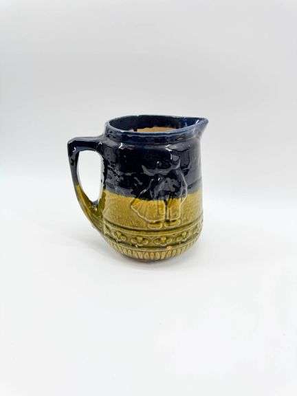 Two-Tone Glazed Ceramic Pitcher with Relief Design