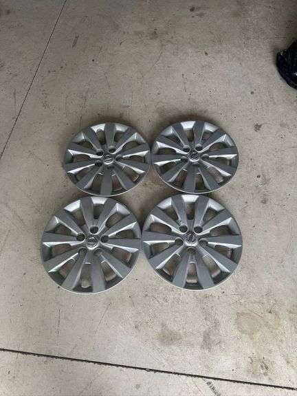 Four Nissan Silver Plastic Hubcaps with 16-Inch Diameter