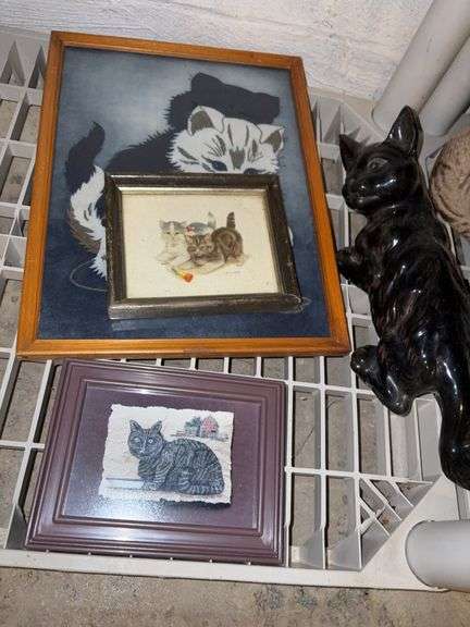 Cat statue and pictures