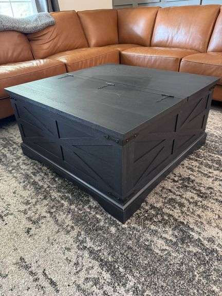 Black Wooden Coffee Table With Lift-Top Storage and Hinged Lid