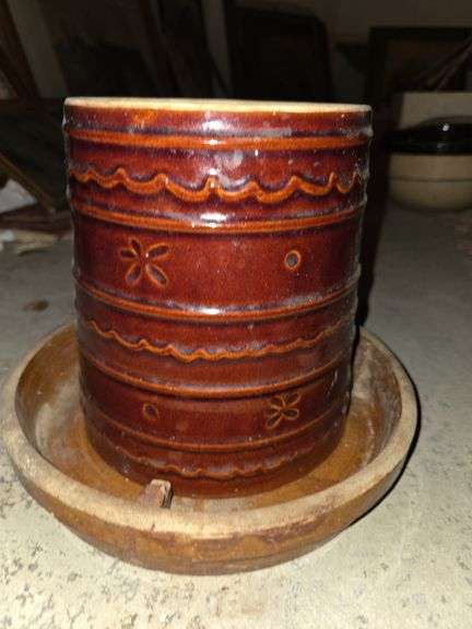 Large brown crock with plate