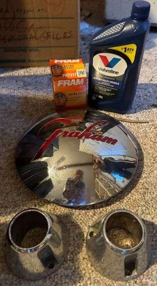 Vintage Automotive Lot Featuring Graham Hubcap, Fram Oil Filter, Valvoline Oil, and Metal Covers