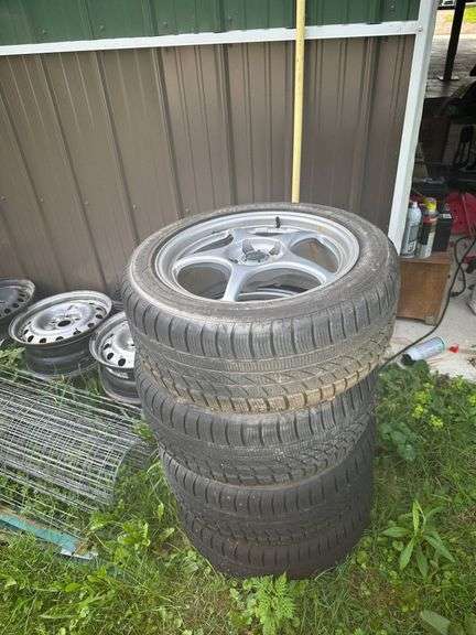 Four Racing Brand Alloy Wheels with Winter Tires
