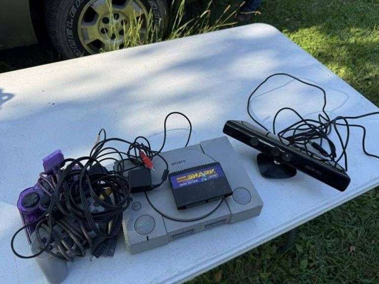 Sony PlayStation Console with Xbox 360 Kinect Sensor - Auction Ohio