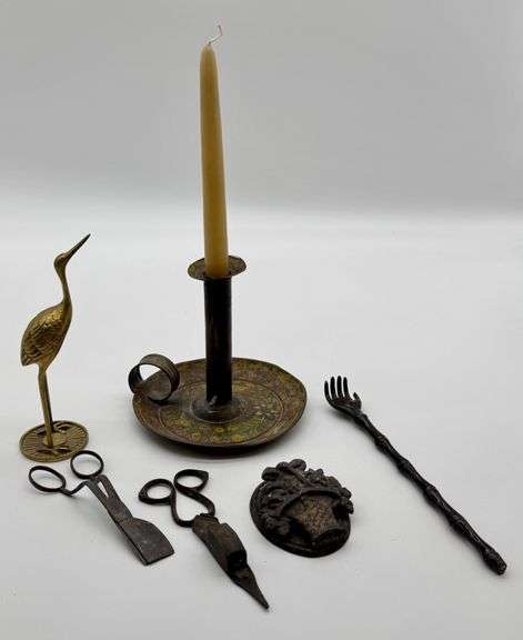 Decorative Metal Objects Including Candleholder, Figurine, and Tools