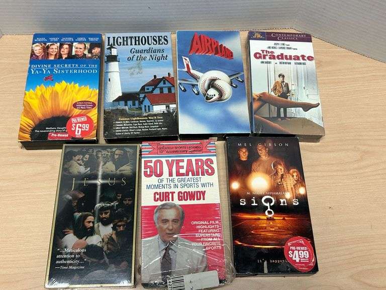 Lot of 7 VHS Tapes – Movies & Documentaries (Signs, Airplane, The Graduate, More)
