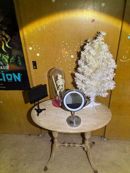Table Items: Skeleton in Glass Dome, Vanity Mirror, White Christmas Tree, Black Display Stand