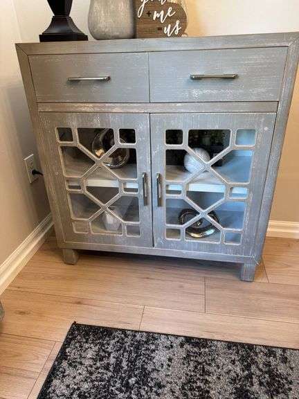 Gray Wooden Cabinet with Glass-Paneled Doors and Two Drawers