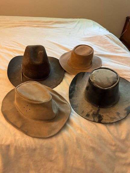 Four Leather and Felt Western-Style Hats