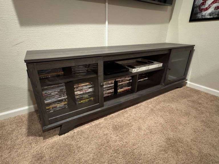 Dark Wood Entertainment Console With Glass Doors and Open Shelving