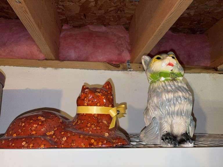 2 large cat statues