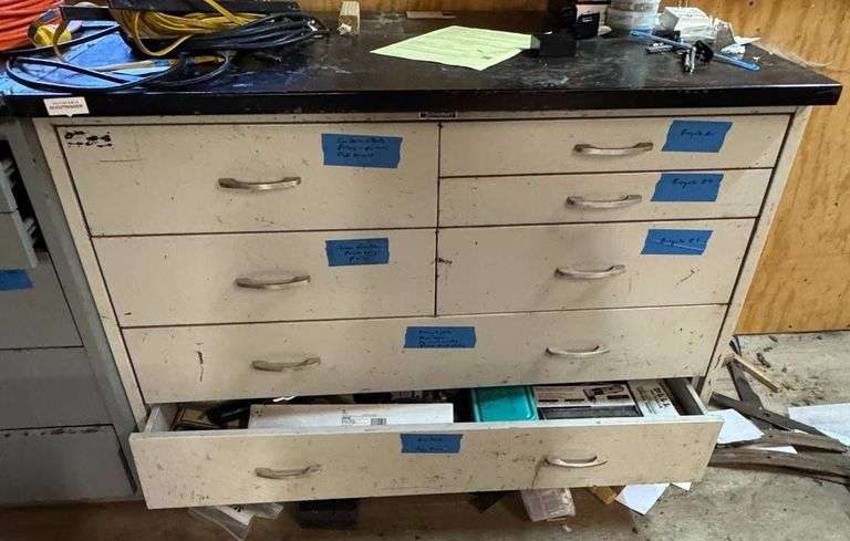 Metal Workbench with Integrated Drawers Containing Assorted Tools and Parts