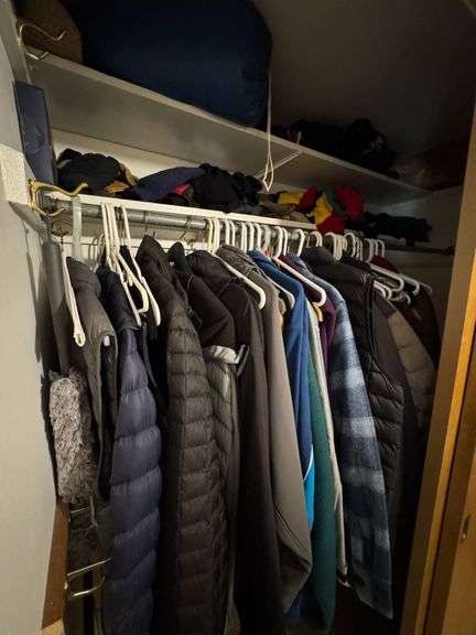 Closet Contents Including Outerwear, Clothing, and Accessories