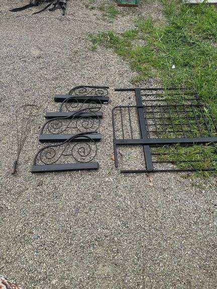 Metal Fence Sections and Decorative Scrolls with Hand Tool