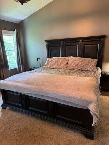 Dark Wood King-Size Bed Frame with Decorative Paneling and Molded Details