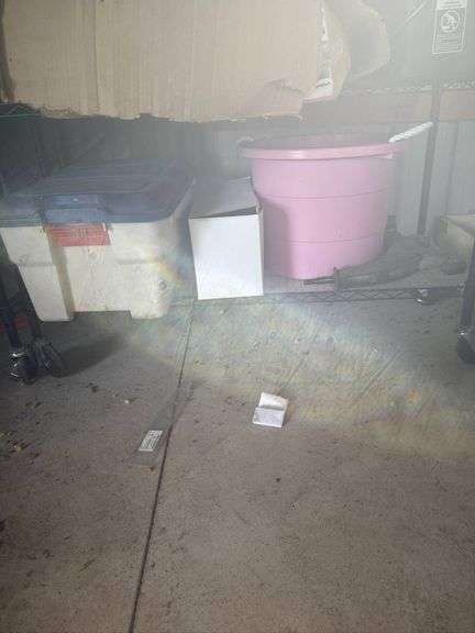 Household Items Including Storage Bins, Aquarium Decorations, and Miscellaneous Parts