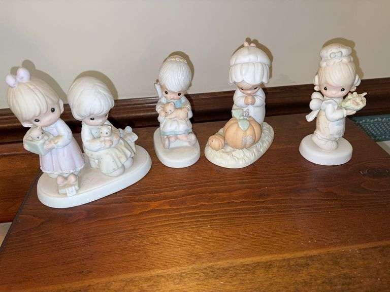 4 Precious moment figures