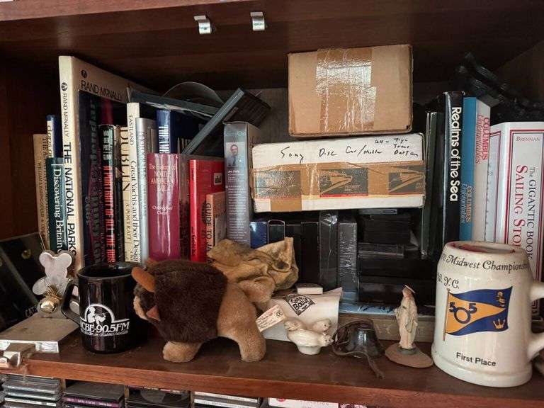 Books, Collectibles, and Assorted Decorative Items Display