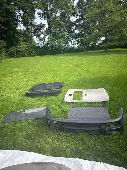 Automotive Interior Components Including Dashboard, Door Panels, and Rear Seat Cushions