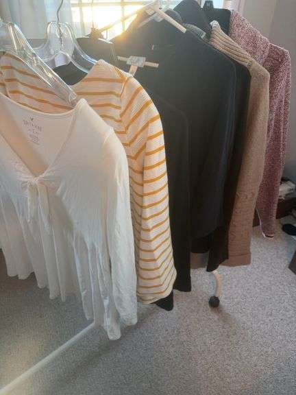 Woman’s long sleeve/Sweaters size medium