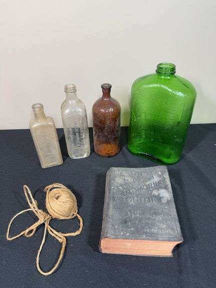 Lot of Antique Bottles with 1910s Automobile Guide Book