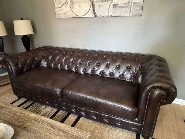 Brown Tufted Leather Sofa with Rolled Arms and Nailhead Trim