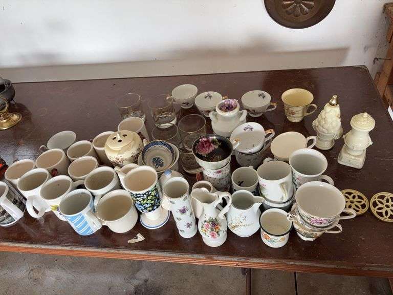 large lot of coffee mugs