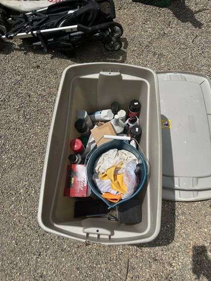 Storage Bin with Mixed Automotive and Cleaning Supplies
