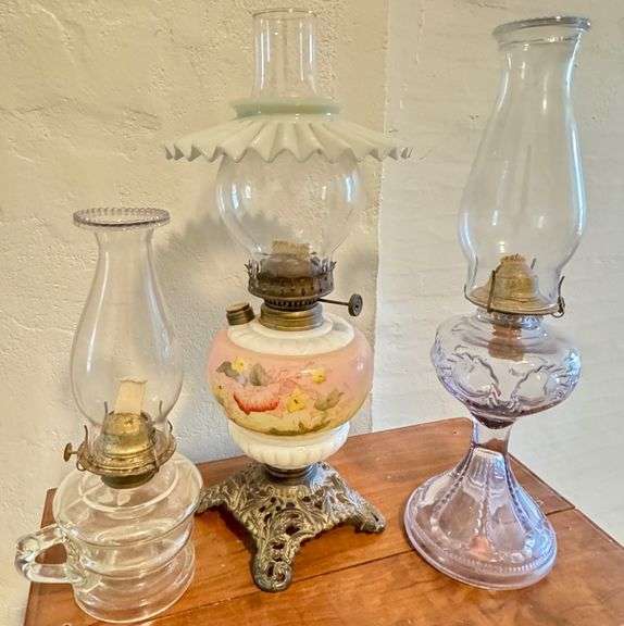Three Vintage Oil Lamps With Glass Chimneys and Floral Motifs
