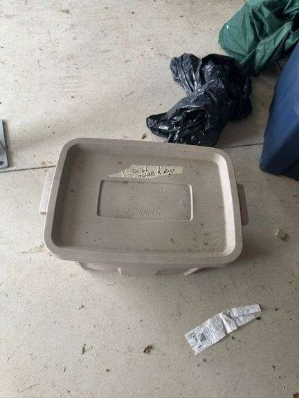 Beige Plastic Storage Bin with Towels Included