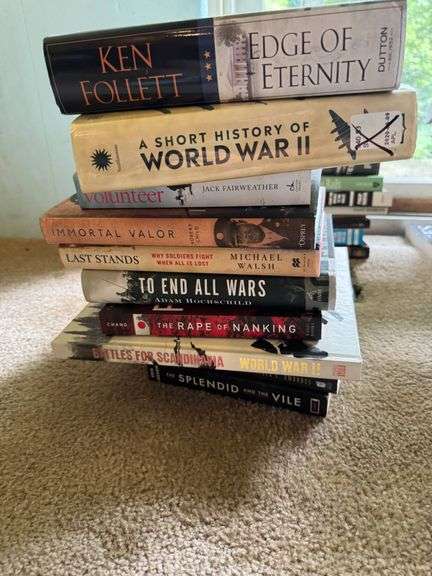 Stack of Hardcover and Paperback Books on Historical and Military Topics