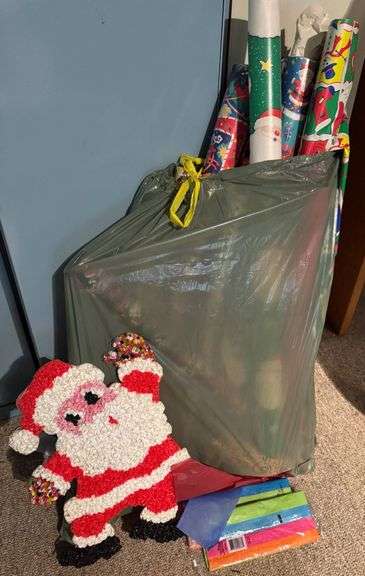 Holiday Gift Wrap Rolls and 1970’s Santa Decoration