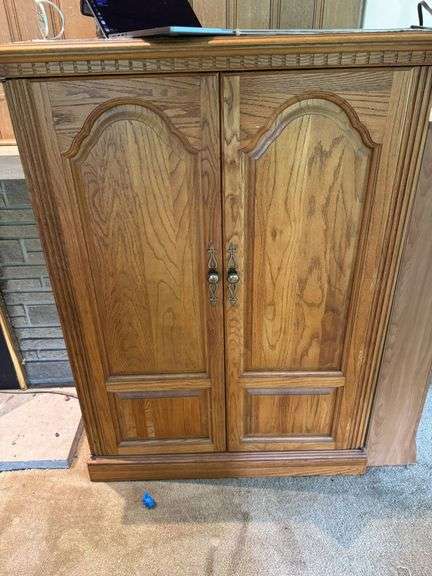 Wooden Cabinet with Electronics and Media Contents