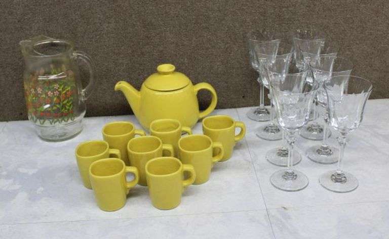Glass Pitcher, Yellow Teapot, Mugs, and Glassware