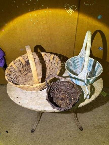 Three Woven Baskets in Various Styles and Colors