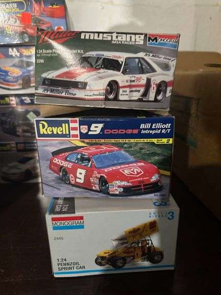 Three 1/24 Scale Plastic Model Kits: Monogram Miller Mustang, Revell Dodge Intrepid, and Monogram Pe