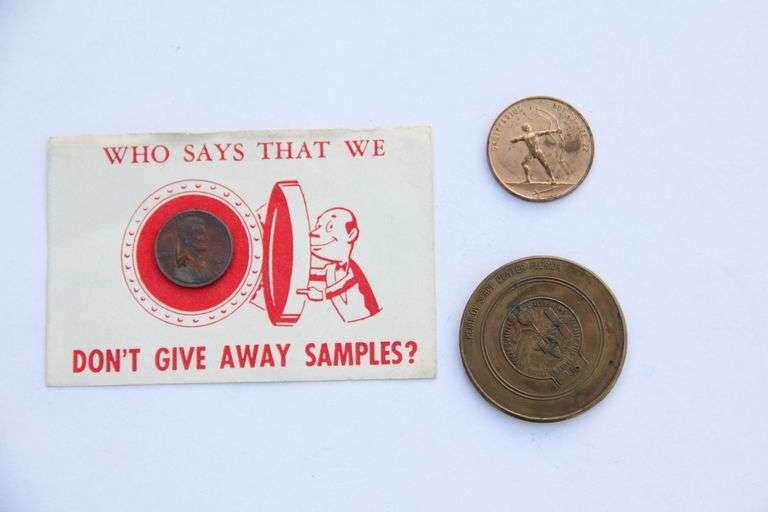 Lot of three miscellaneous coins and tokens.