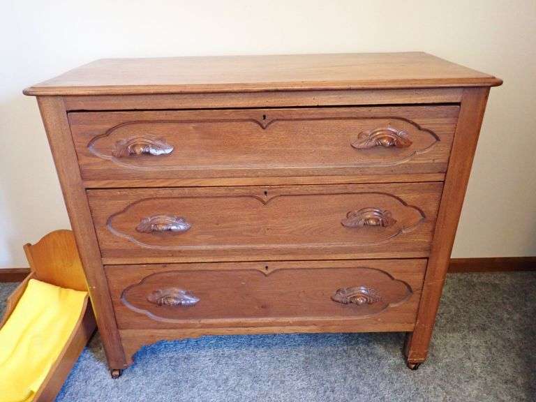 Three-Drawer Wooden Dresser with Carved Drawer Pulls