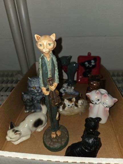 Several cat figures
