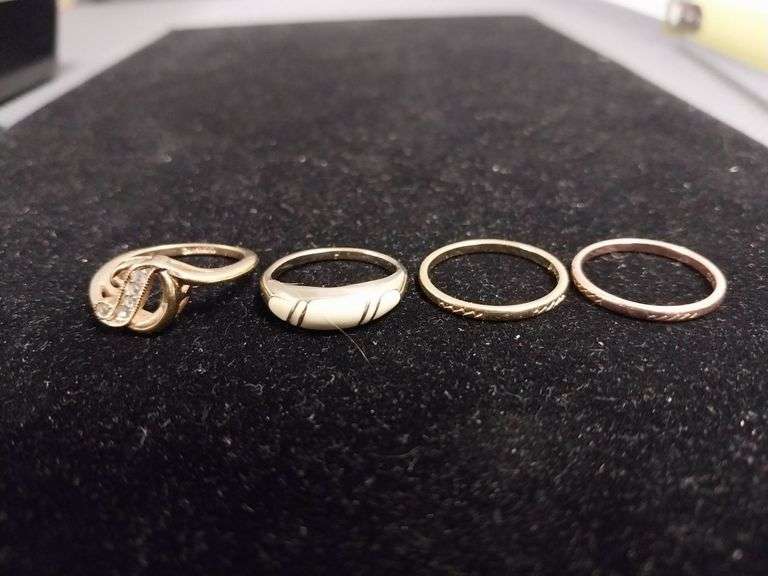 Four Avon Rings in Gold Tone Finish